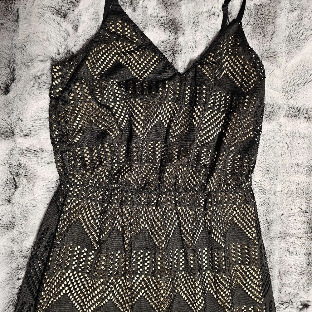 Black lace dress with tan under dress
